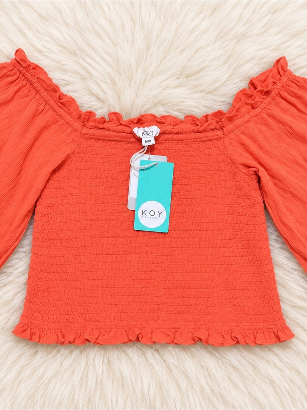 Koy Resort collection Riviera Smocked Boho crop top in orange